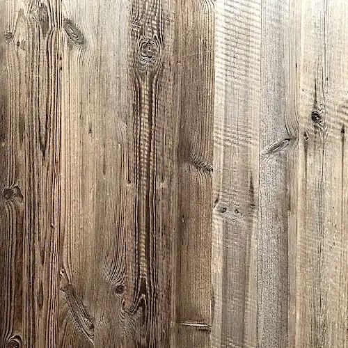 Une vue rapprochée d'un mur en planches bois vieilli