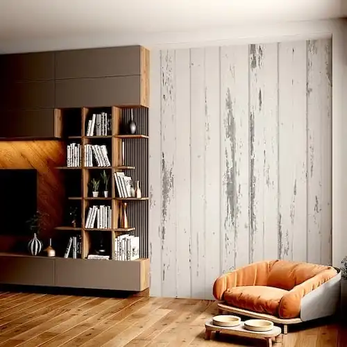  Un salon avec un mur en bois blanc vieilli et des étagères. 