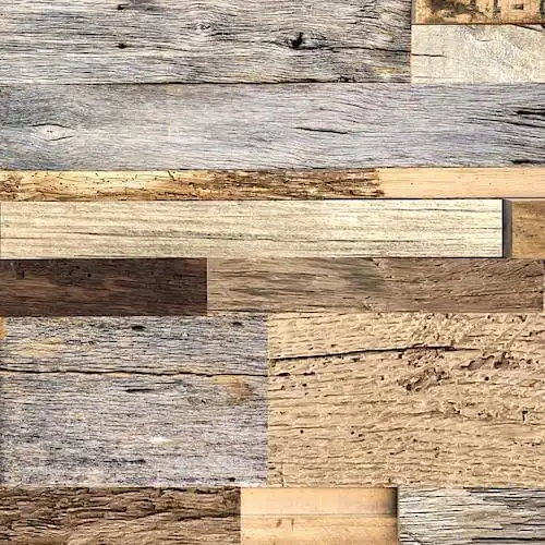 un gros plan d'un plancher en bois ancien avec des couleurs différentes