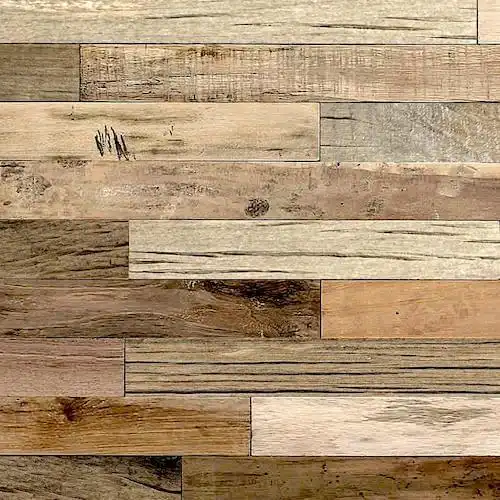 un gros plan d'un plancher en bois vieux avec des couleurs différentes