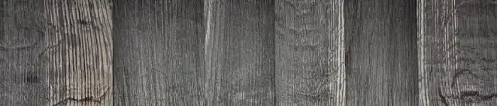 Un gros plan d'une clôture en chêne noir